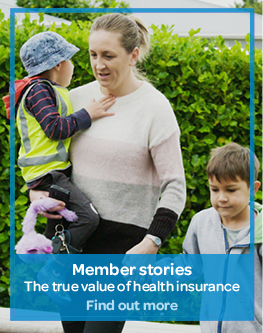A mother walking with her two children