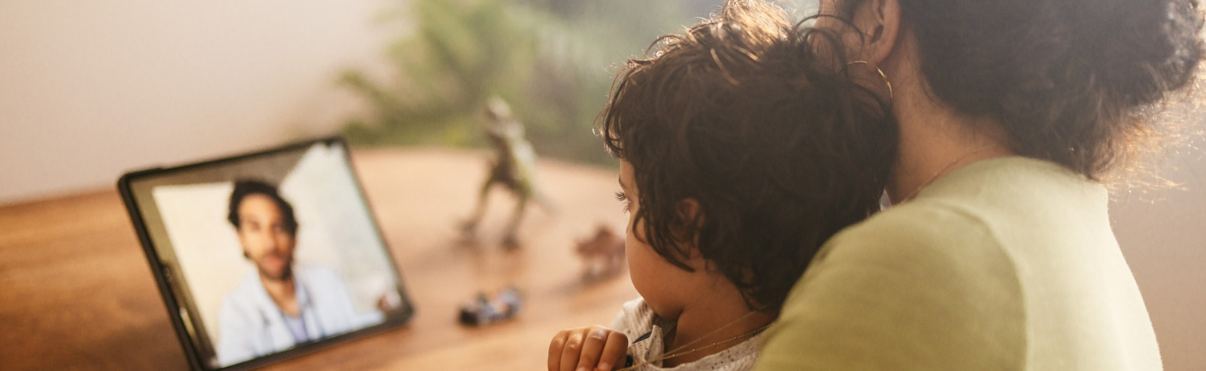 Lady and son attending telehealth visit