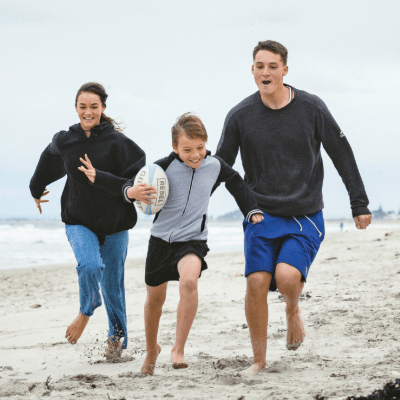 Kids running on beach