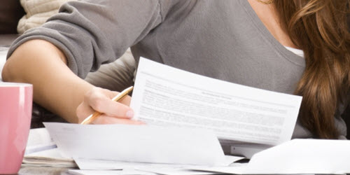 Southern Cross Health Society - Adviser support A woman working on her laptop