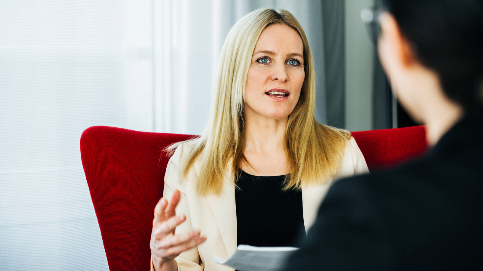 A woman talks in the office