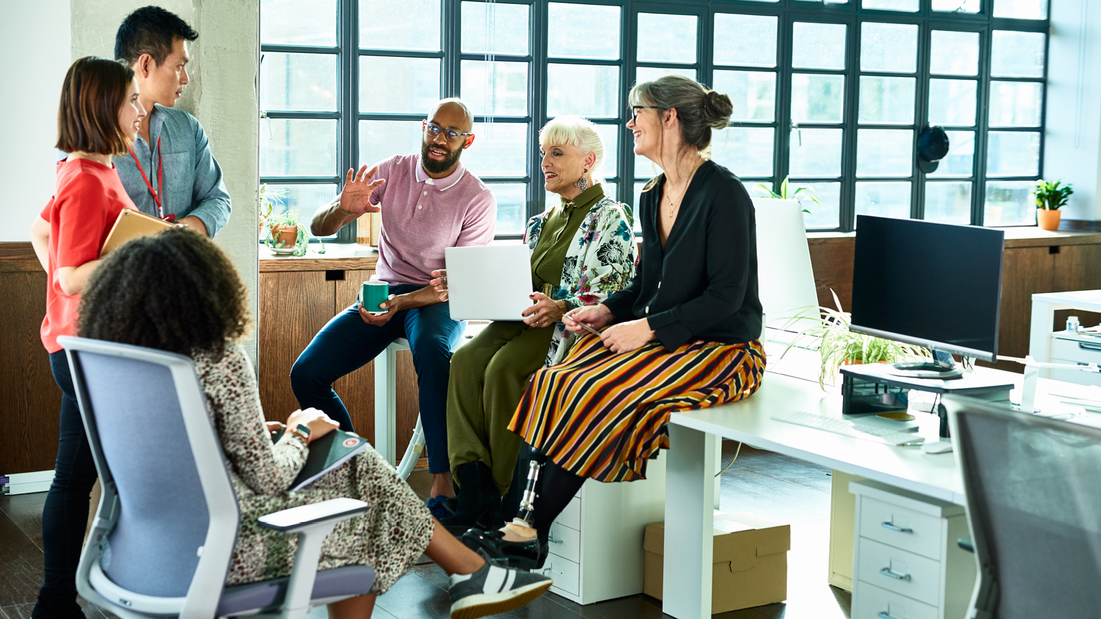 a group of people in the office